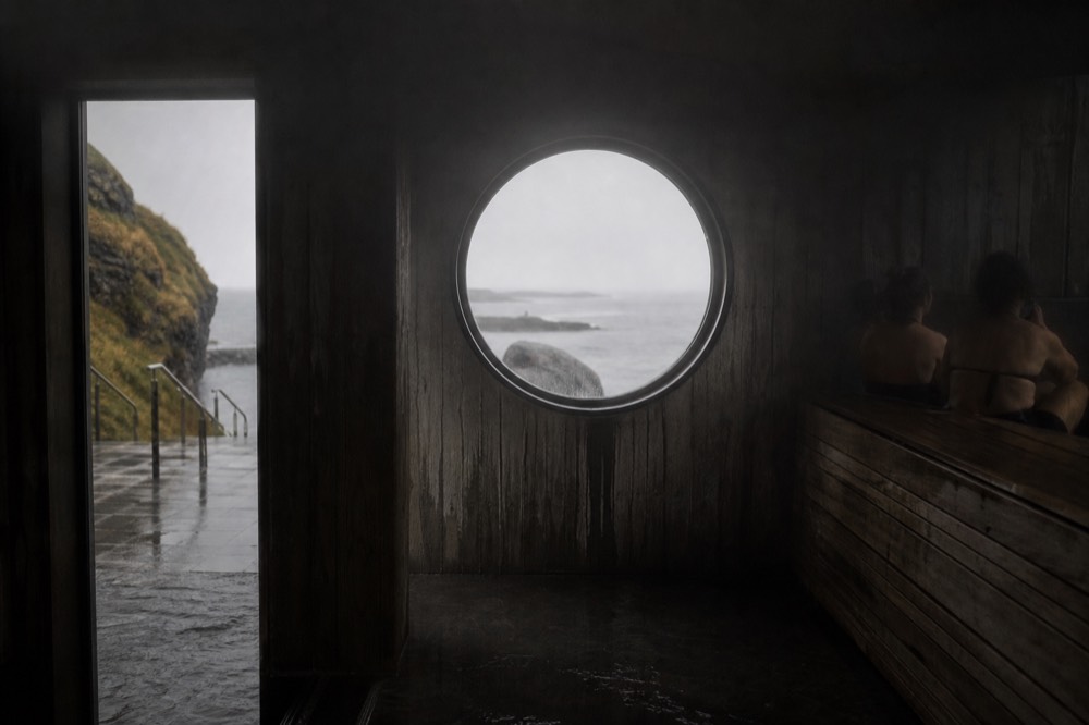 Steam room interior with a window facing the sea
